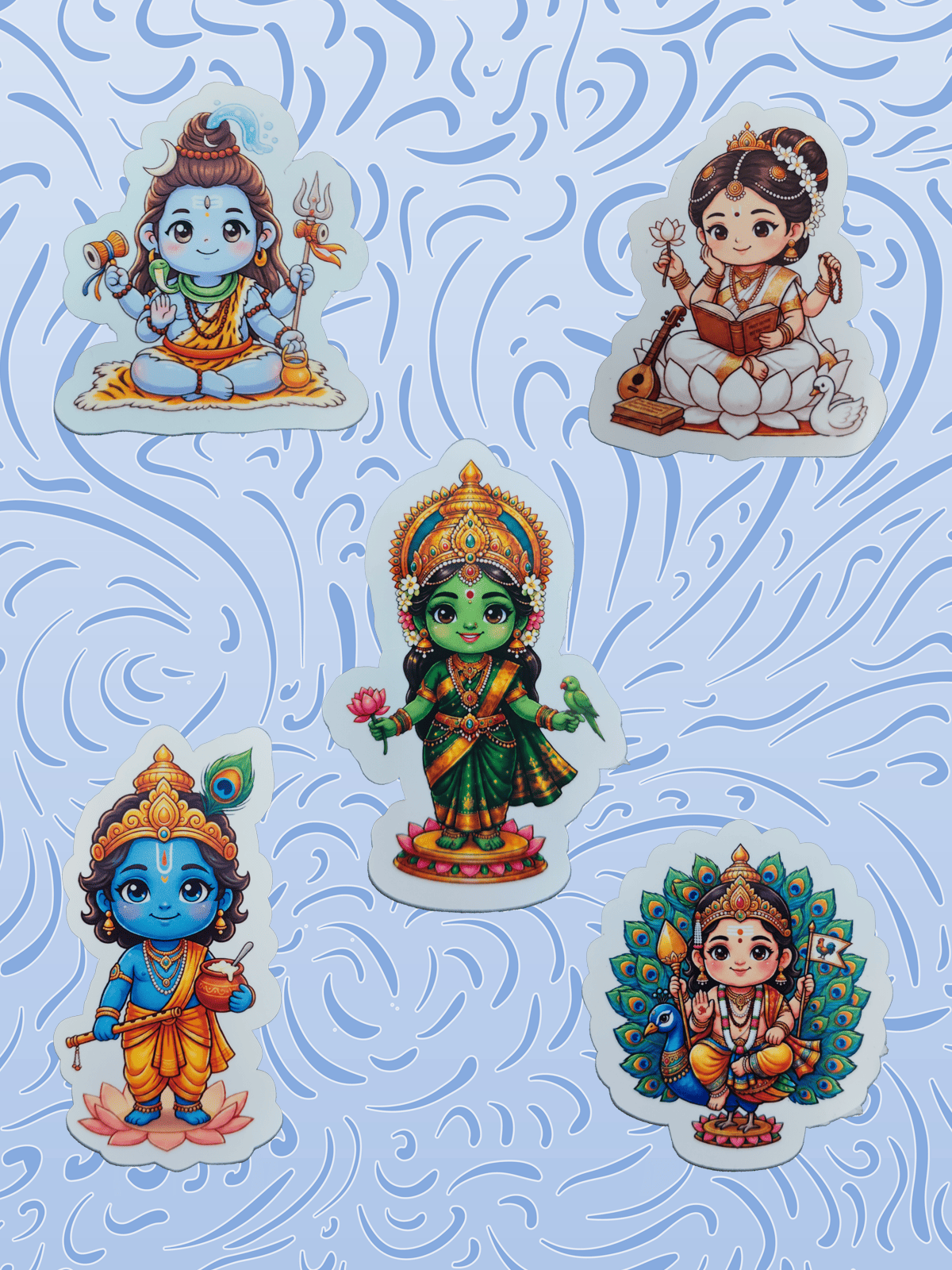 Devotional sticker collection banner featuring cute chibi-style Hindu deity designs, including Shiva, Saraswati, Krishna, Meenakshi Amman, and Murugan on a blue patterned background.