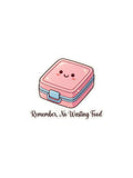 Remember, No Wasting Food sticker featuring a cute pink lunch box with a smiling face, blue latch, sparkles, and brown script text on a black background.