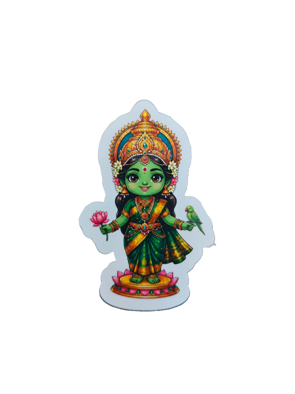 Chibi-style Meenakshi Amman devotional sticker featuring a green goddess in a traditional saree, gold crown, lotus flower, and parrot on a black background.