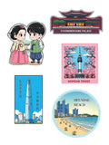 Set of four illustrated stickers featuring Gyeongbokgung Palace, Namsan Tower, Lotte Tower, and Heundae Beach on a white background.